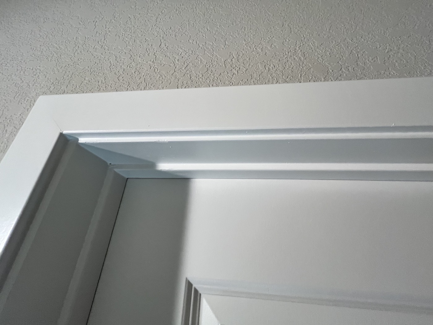 Trim corner before touch-up painting